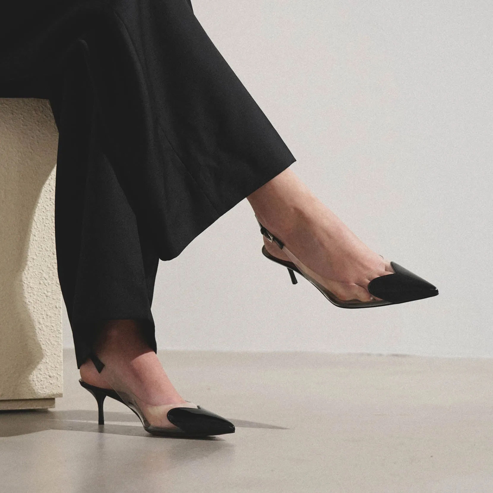 Coeur 55 black patent slingbacks