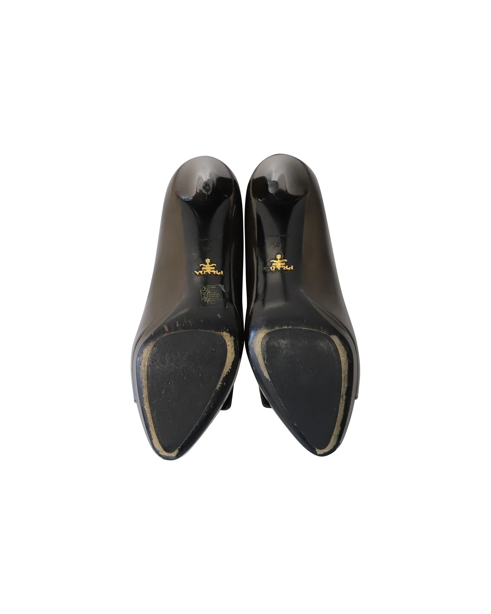Prada Buckle Embellished Pumps in Brown Patent Leather